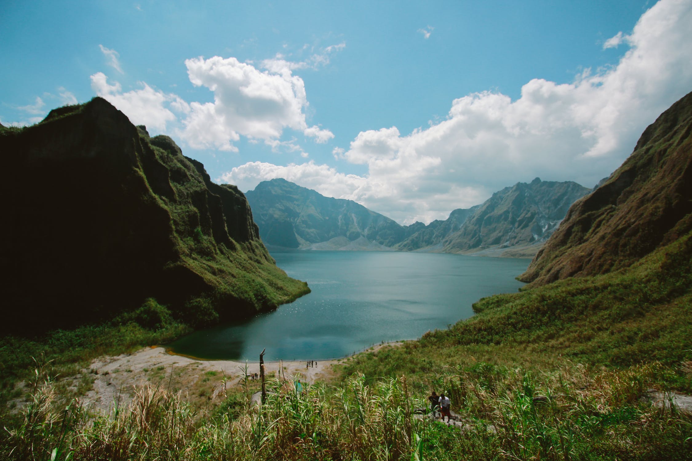 mountains near body of water