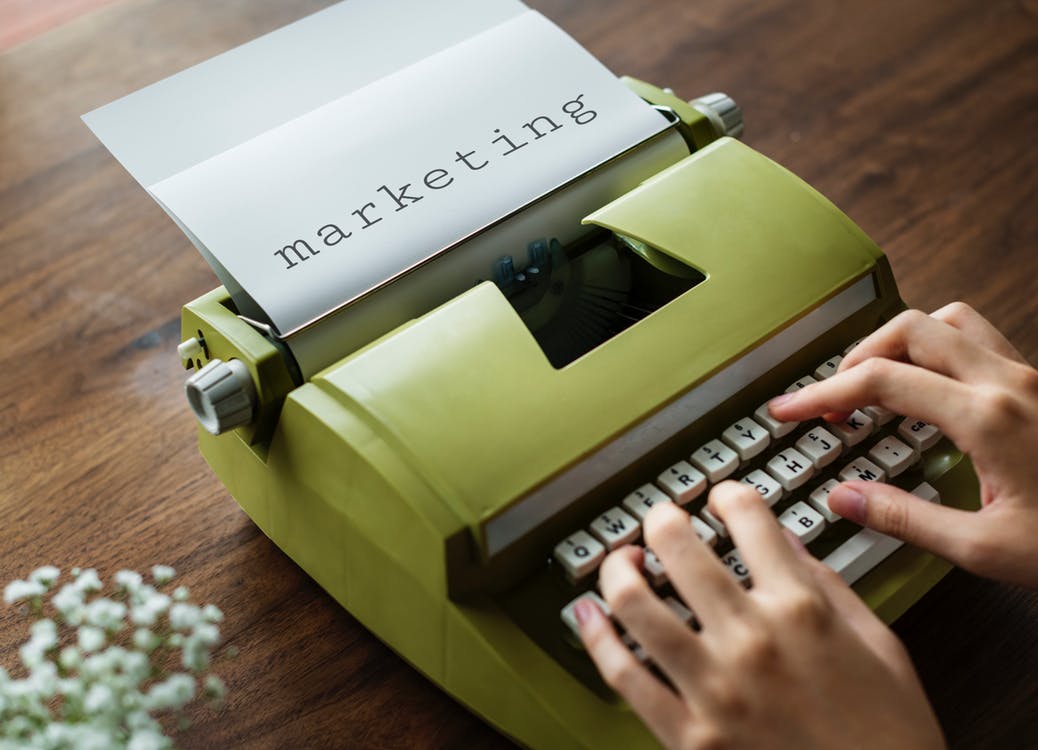 User typing on a typewriter