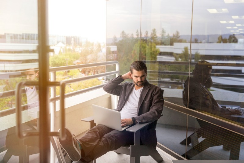 man working in balcony