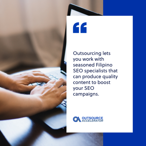 a woman writing in the table as part of SEO outsourcing in the Philippines