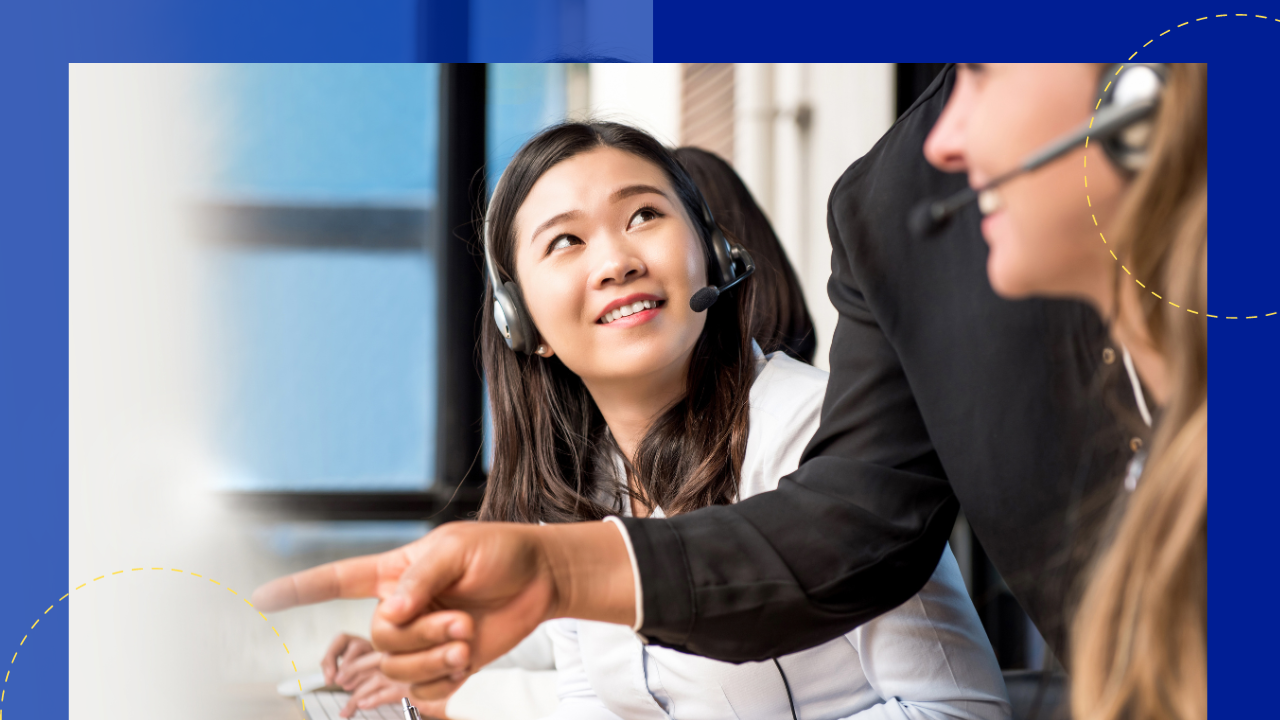 Woman staff being trained by supervisor in call center