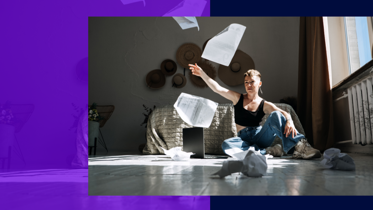 angry stressed out young woman working on laptop at home and throwing up documents