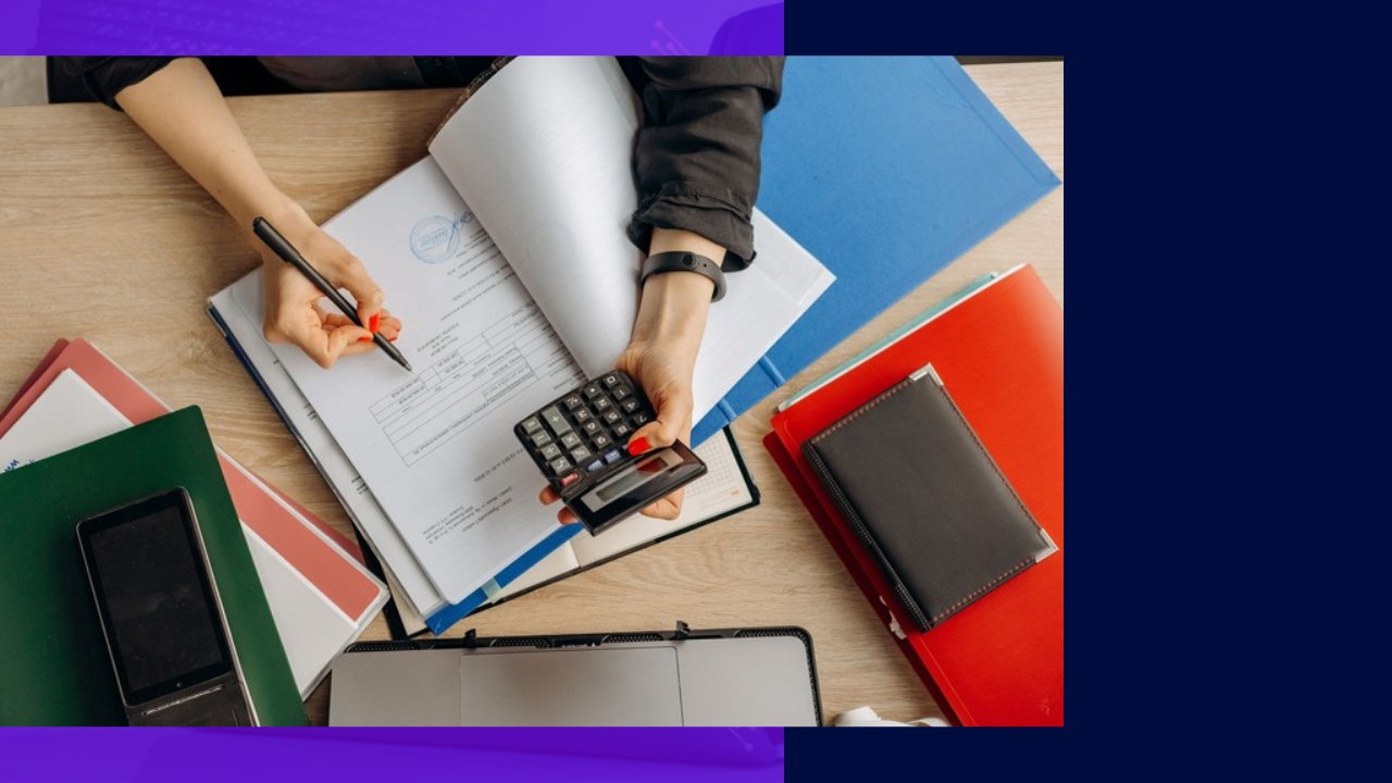 Hands with calculator and pen review documents, maximizing cashflow and preventing bad debt.