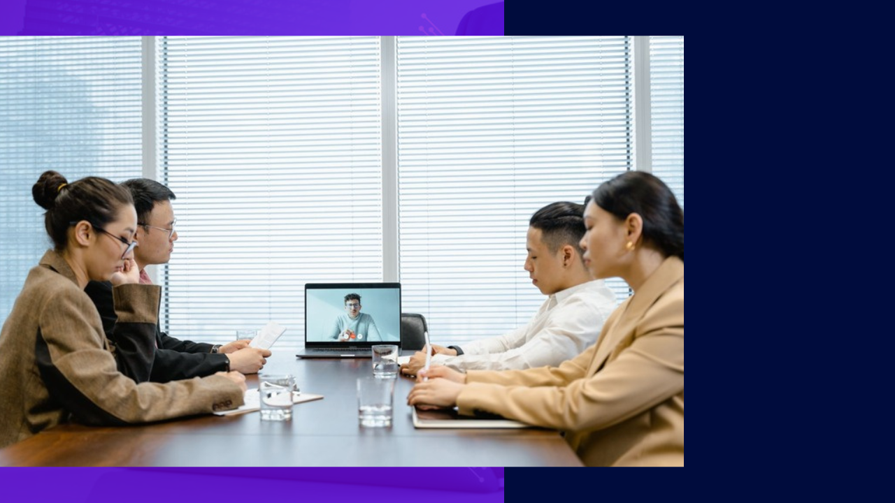 Team meeting with remote participant via laptop, keeping remote teams engaged.