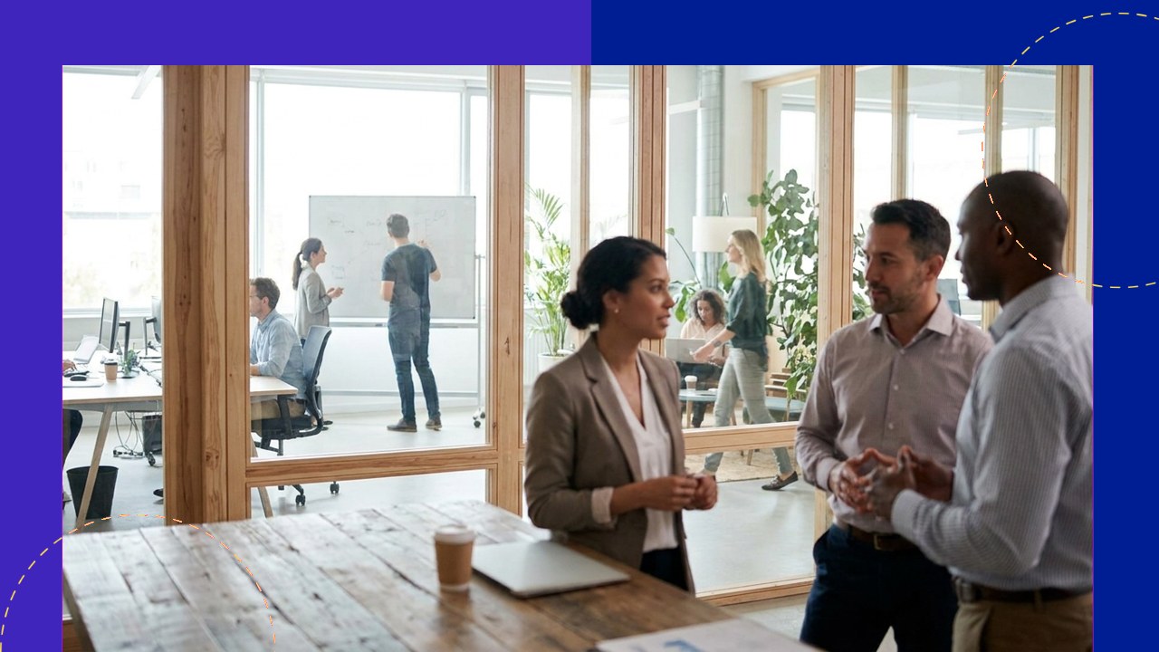 Diverse team collaborating in a modern office, embodying human-centric leadership.
