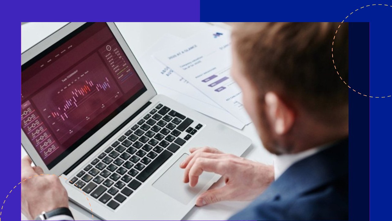 PE firm professional analyzing financial charts on laptop, driving data-driven decisions for ROI.