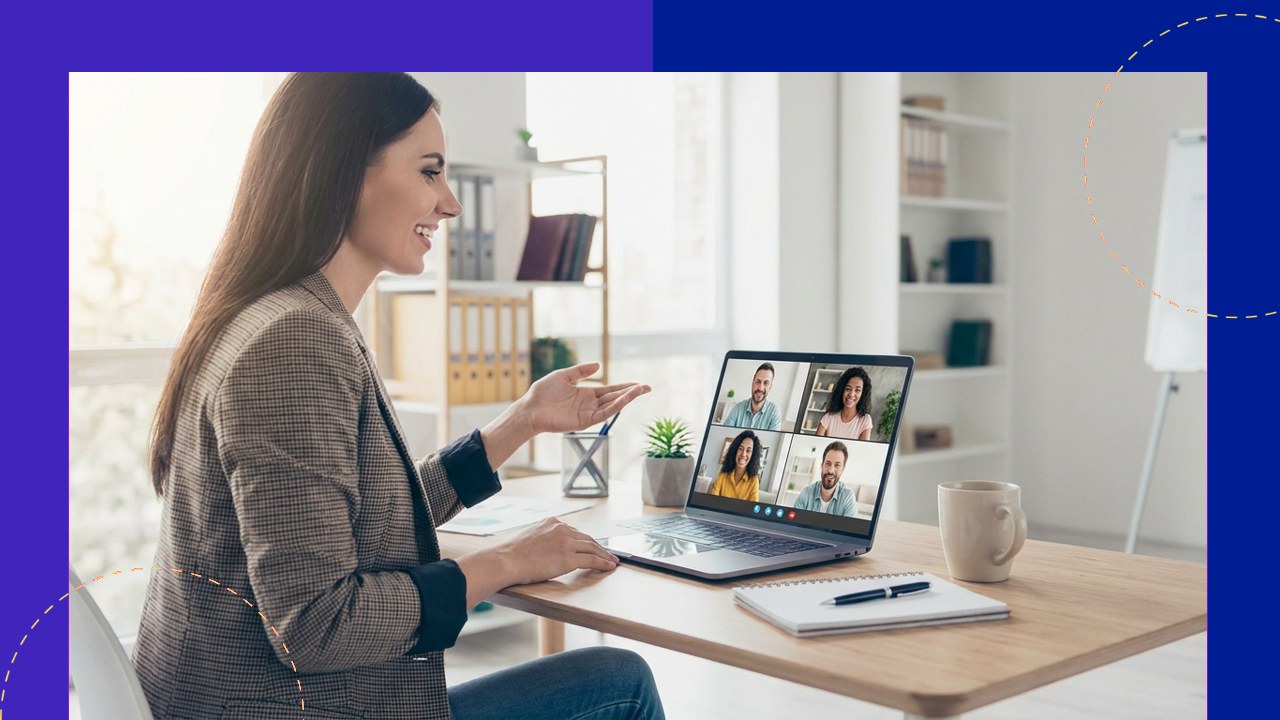 Business owner on a video call with a remote team, illustrating reasons outsourcing is a smart move.