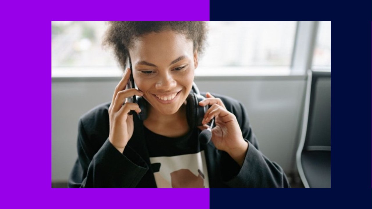 Woman smiling on phone, representing AI call efficiency and team productivity.