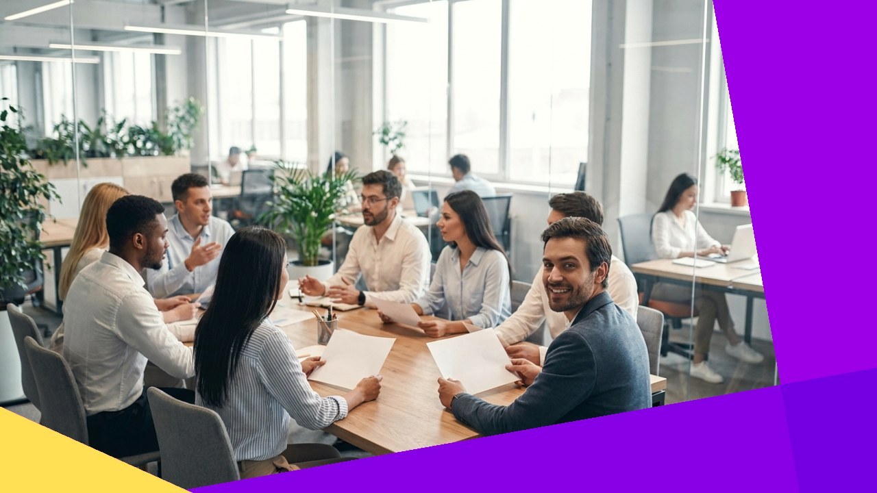 Business professionals in a bright office discuss FairWork Australia's game-changing decision. One smiles.