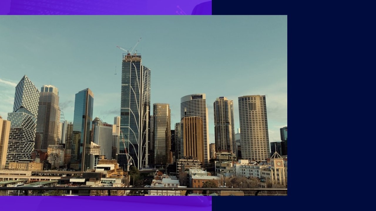 Modern skyline with cranes, representing offshore outsourcing fears for Australian businesses.