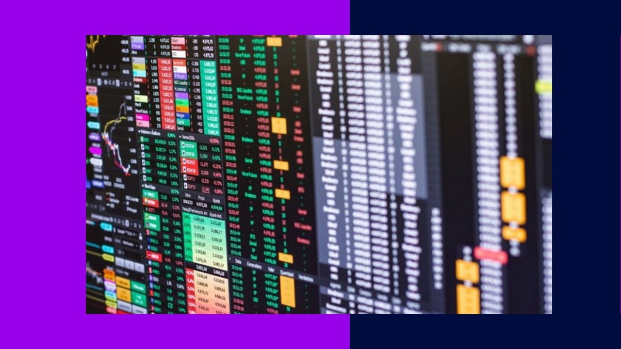 Financial market data screens show charts and numbers, illustrating a BPO's decades-long service.