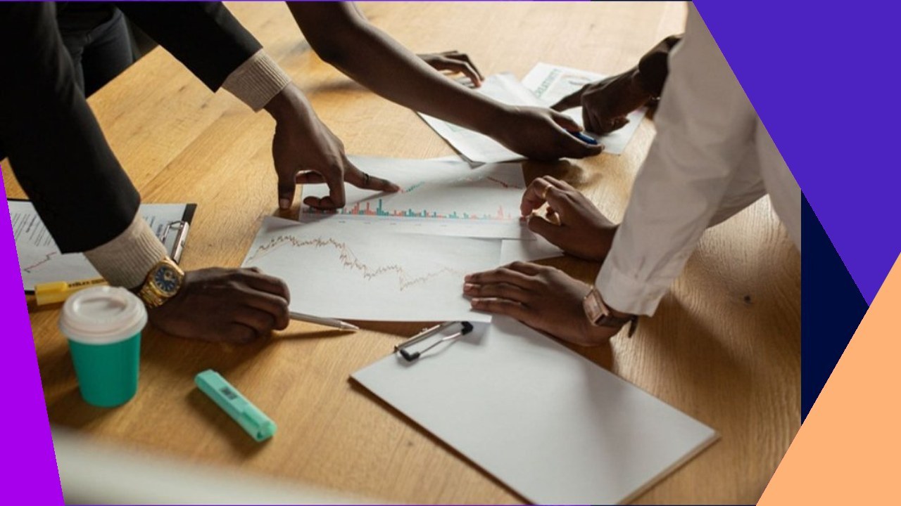 VCs collaborate over charts, streamlining market landscape research for efficient analysis.