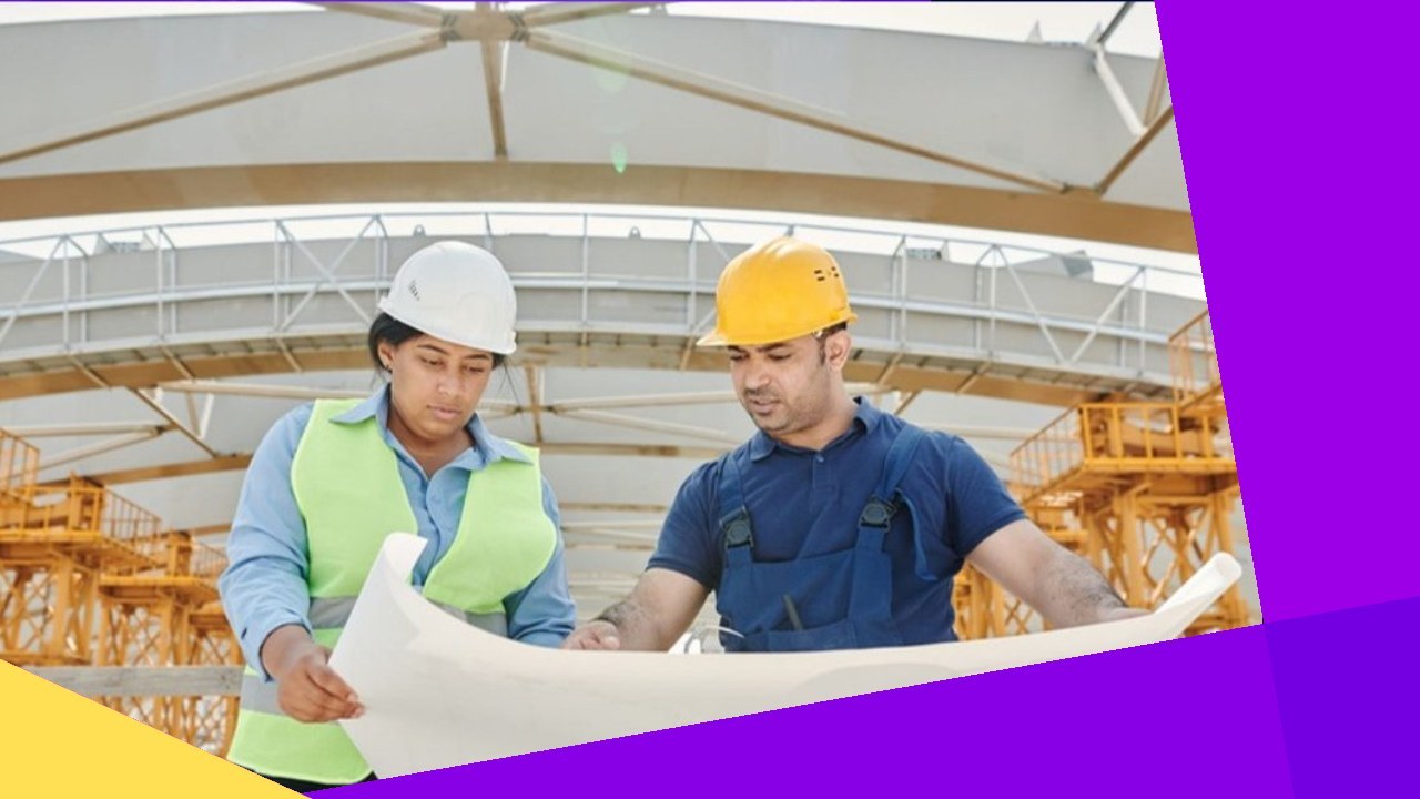 Two construction workers review blueprints on a site, showcasing the offshore staffing model for Australian construction