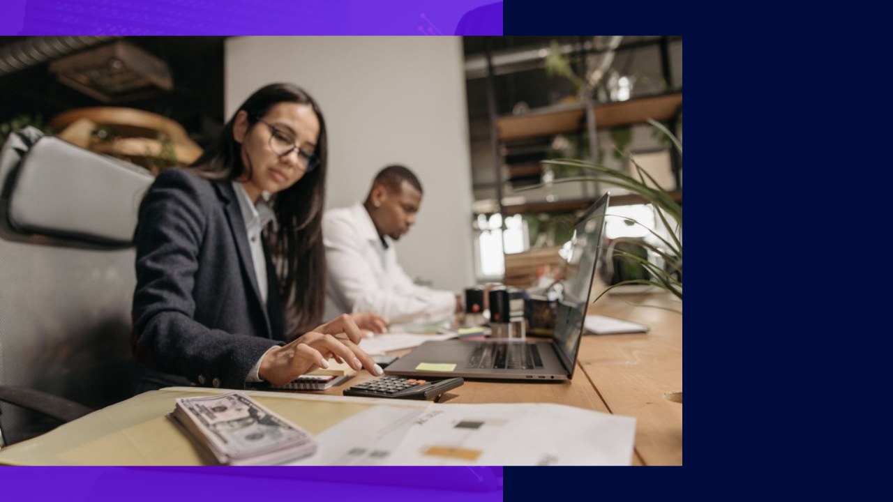 Accounting professionals using calculators and laptops, representing offshore staffing for accounting firms.