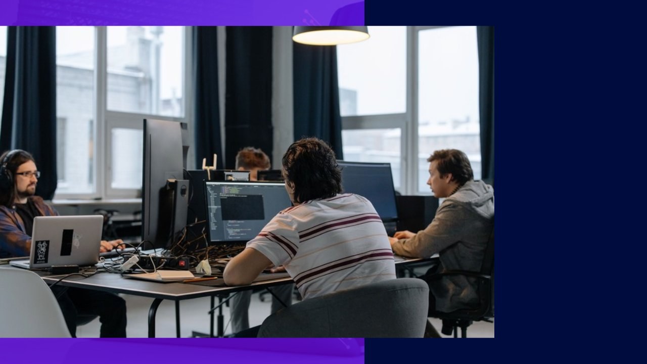 Developers coding in modern office, highlighting top US software companies 2023.
