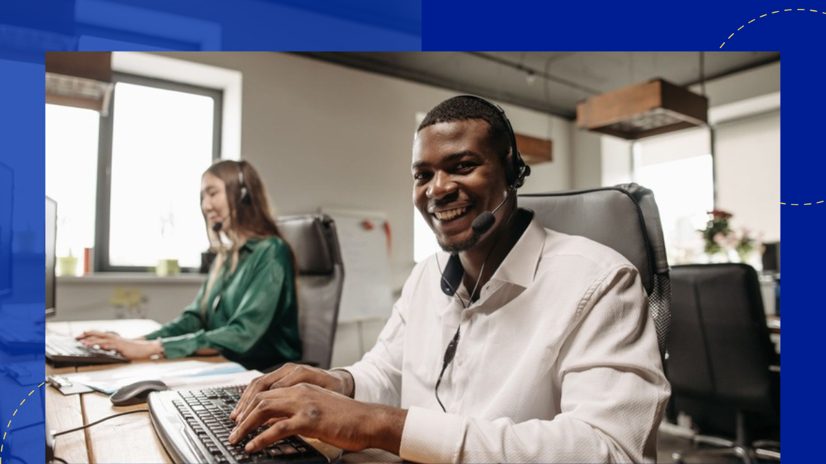 Call-center agent at workstation with colleague behind — the individual seat TP is pledging to transform