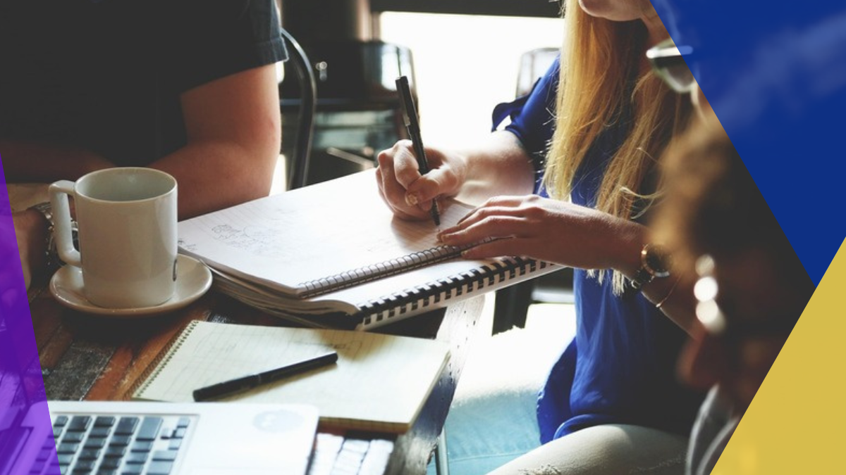 Team collaborating with a notebook and laptop — the two-column math Ingka ran before deploying Billie