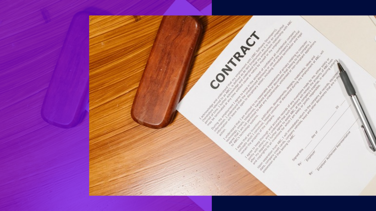 High-angle view of a business contract with pens on a wooden desk — 25 percent off, priced and signed