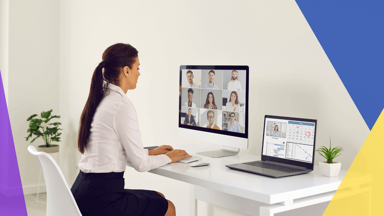 Woman in a white blouse at a workstation with a monitor of a video call grid and a laptop showing analytics, purple and yellow accent panels.