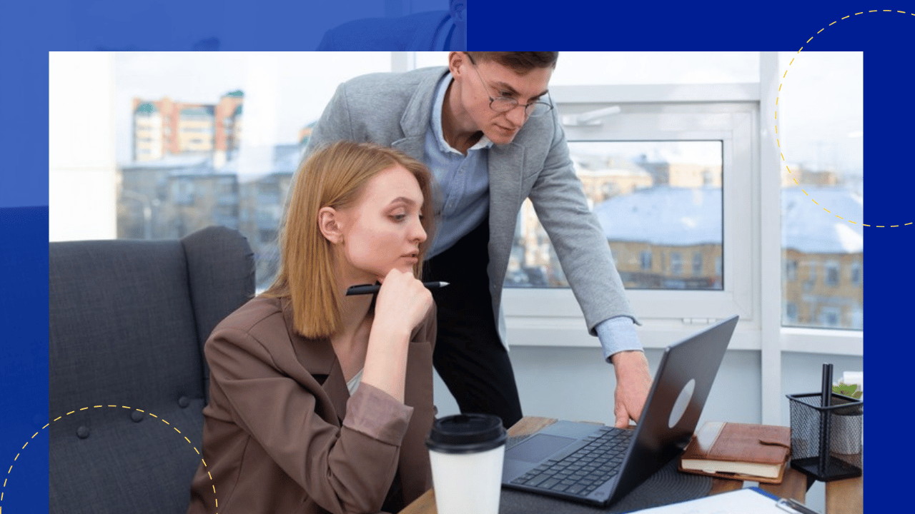AI executive assistant - a manager and assistant working together at a laptop