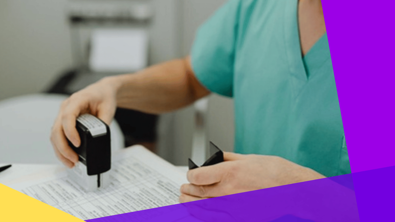 Business associate agreement - a healthcare worker stamping compliance paperwork