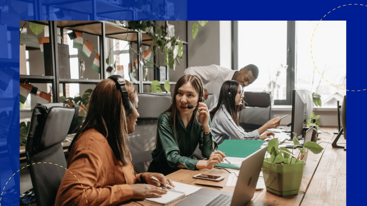 cost of agent attrition - call center agents with headsets working together at a shared desk