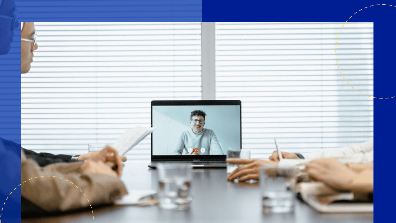 fractional hr for offshore teams - team on a video call with a remote colleague at a conference table