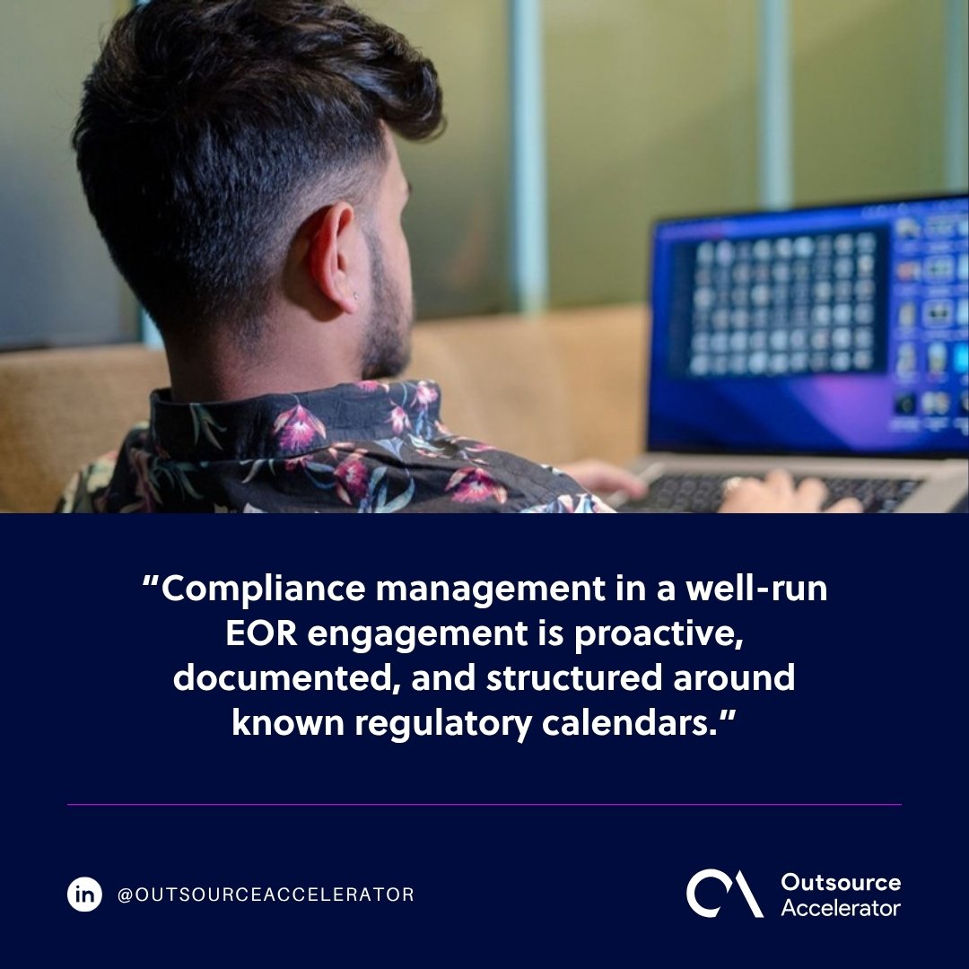 EOR compliance management - a professional working on a laptop, seen over the shoulder