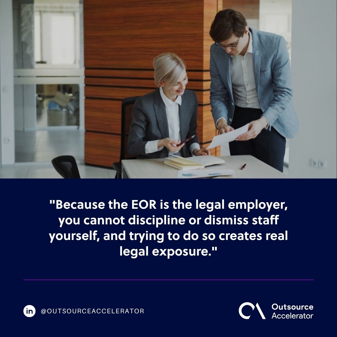 managing an offshore team through an EOR - a manager and an employee reviewing a document