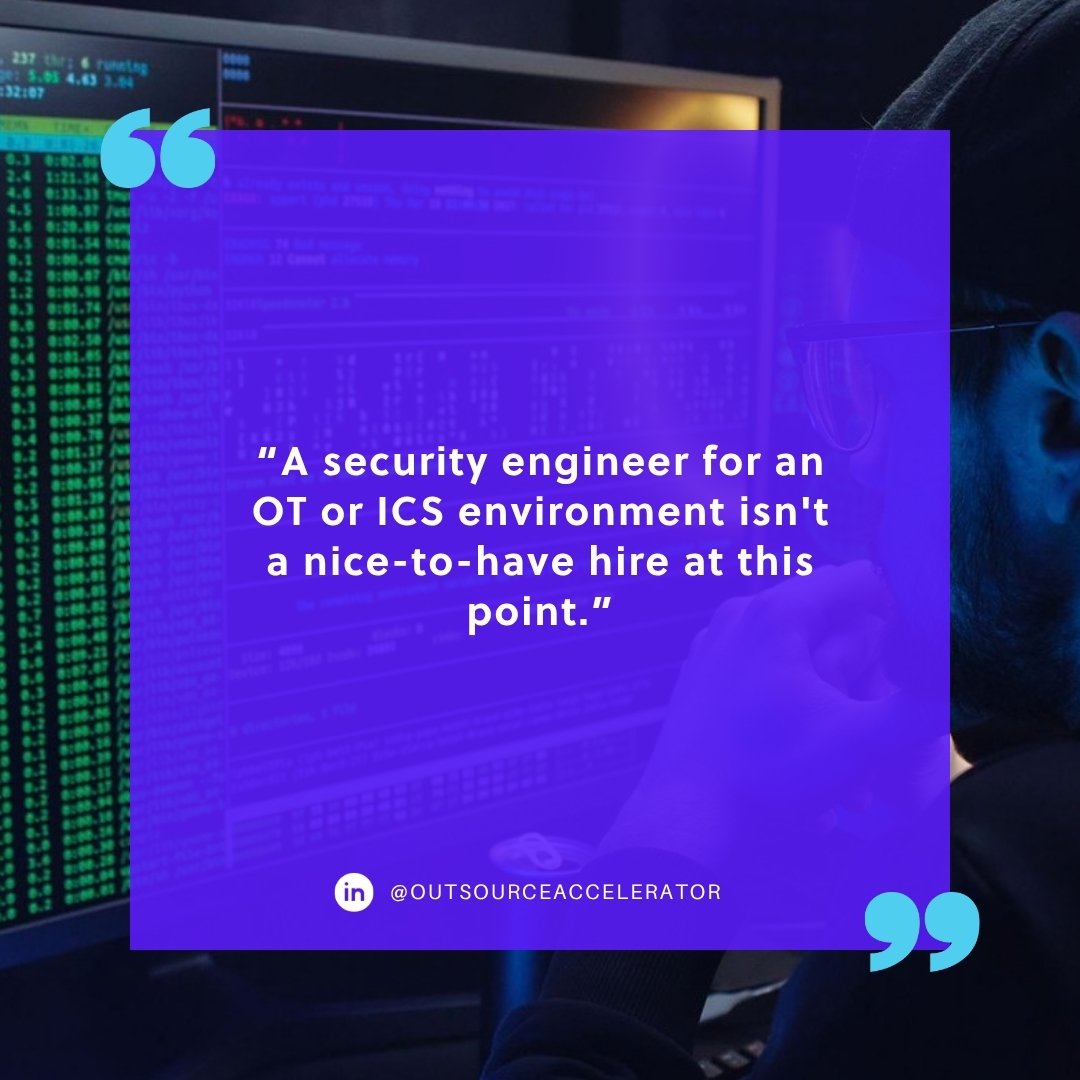 OT IT convergence staffing - a security engineer reviewing code on monitors