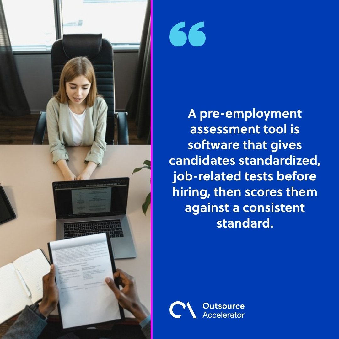 pre-employment assessment tools for contact centers - overhead view of a candidate at a laptop facing an interviewer holding a resume